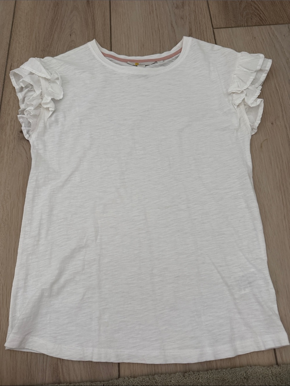 Boden White Tee with ruffles
Size xs